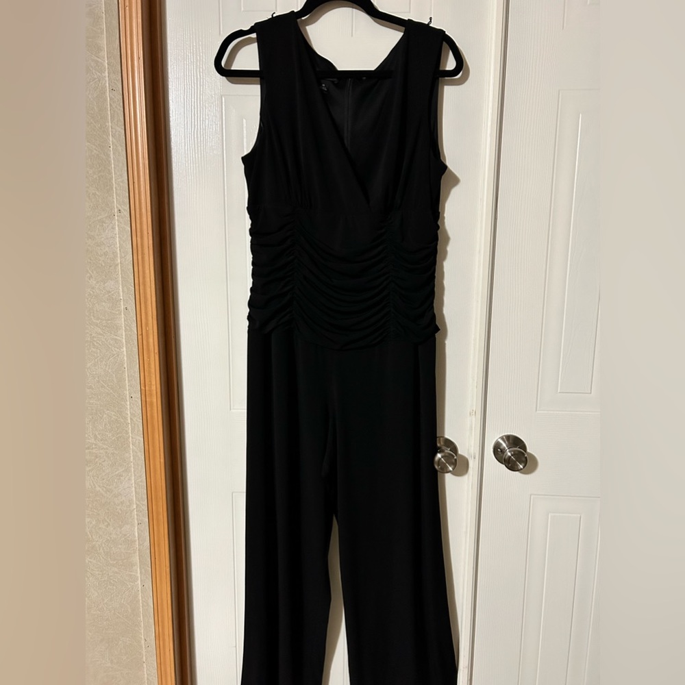 Black dress suit, never worn brand new size 14